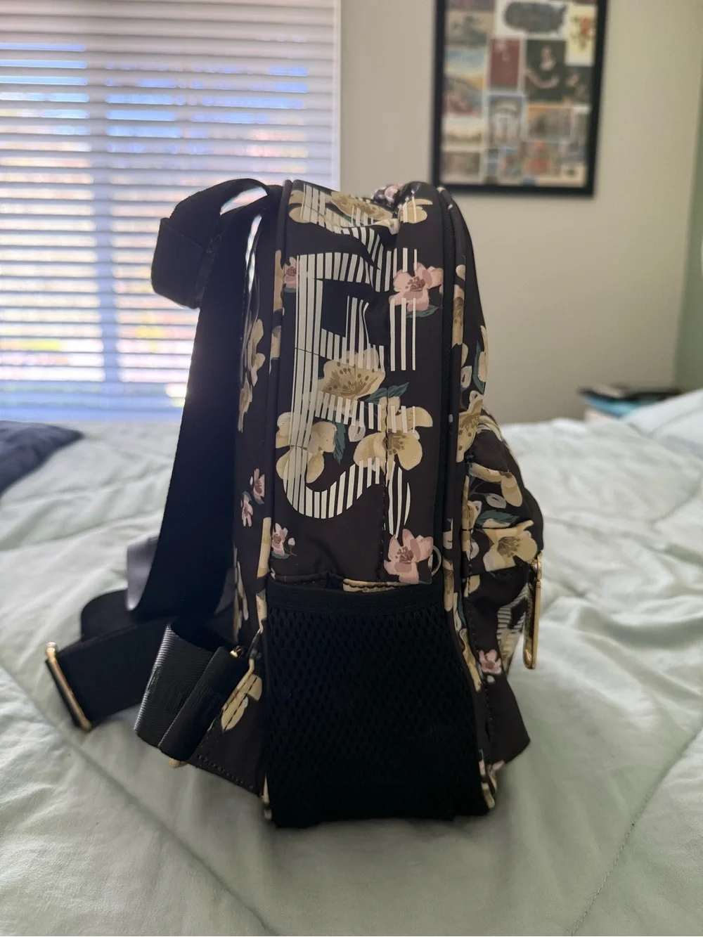 Steve Madden Black Floral Mini Backpack with Gold Accents